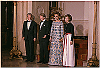 The Shah of Iran, Jimmy Carter, the Shahbanou of Iran and Rosalynn Carter participate in a formal pose during a State Dinner., 11/15/1977 - ARC Identifier: 176872.